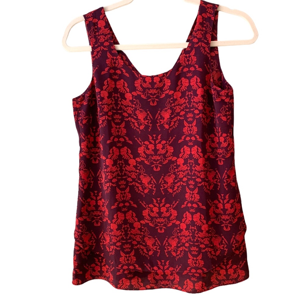 Cabi size XS sleeveless top. Unique red/purple retro cameo patter…